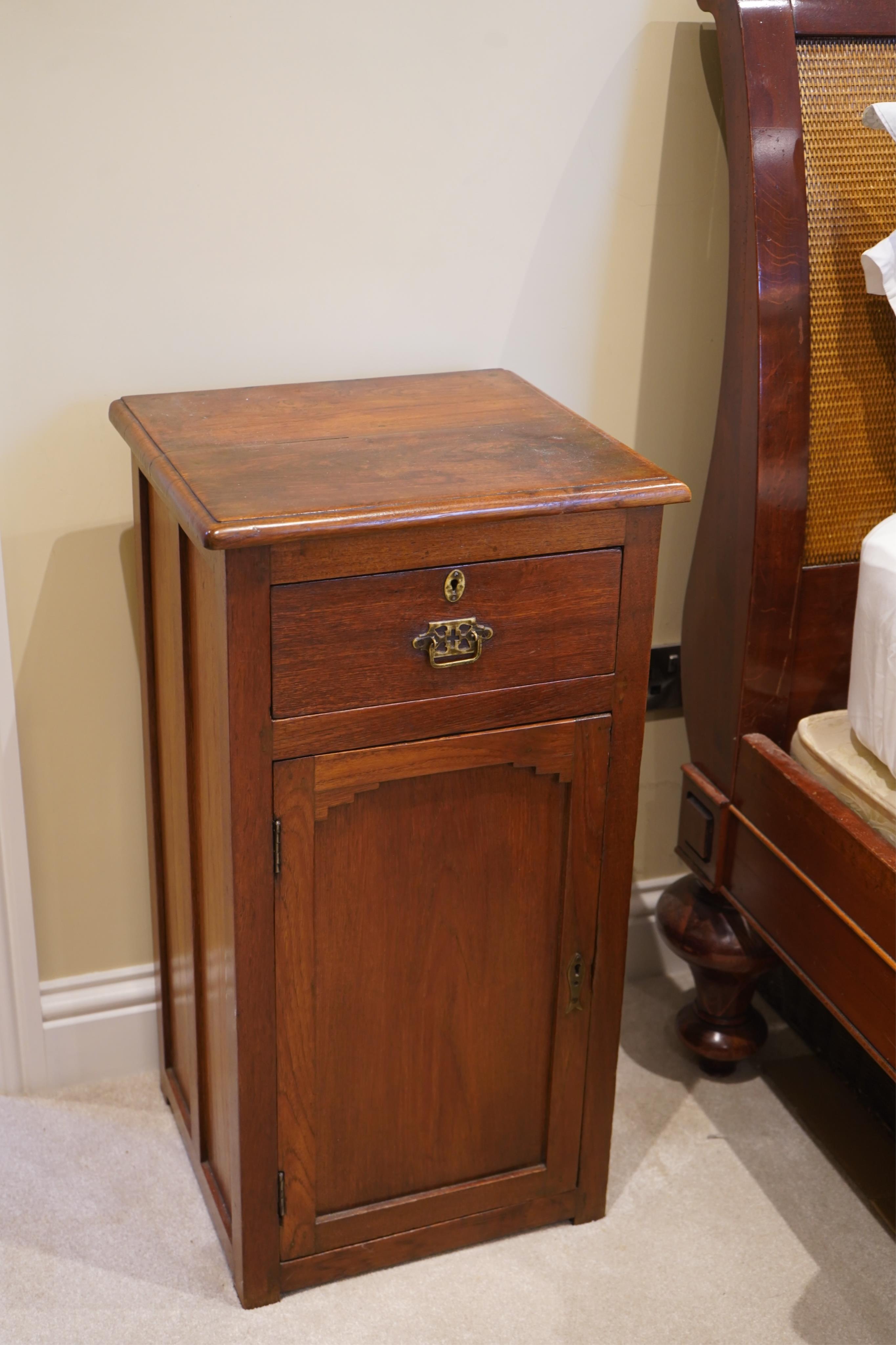 A pair of 20th century Victorian style Anglo Indian teak bedside cabinets, width 44cm, depth 39cm, height 86cm. Condition - good